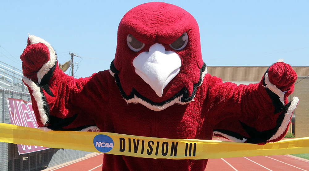 The D3 finish line, being crossed by the McMurry mascot